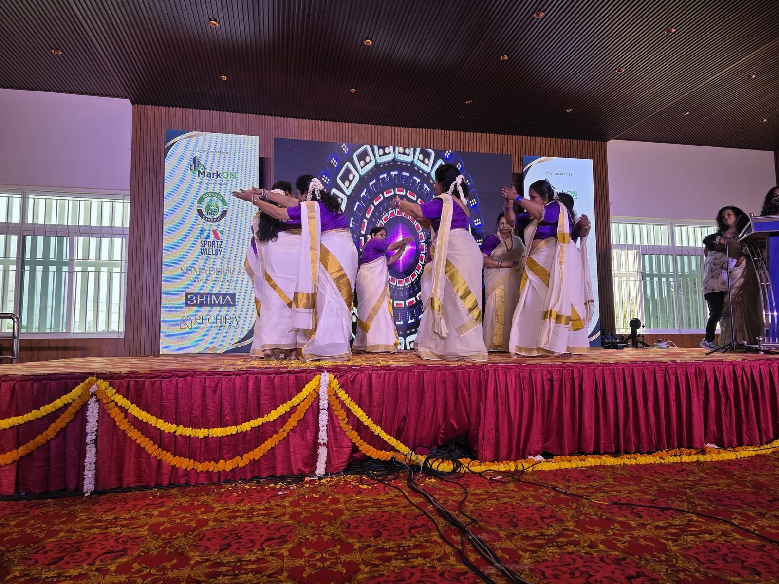 Traditional dance performance in kasavu sarees